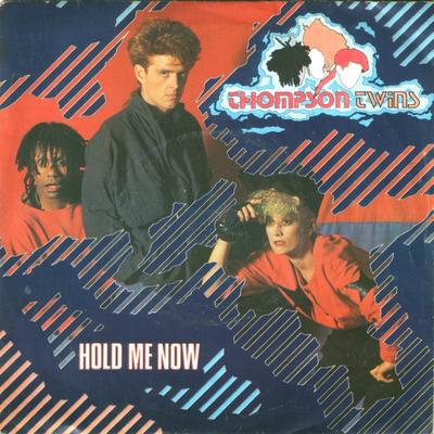 7-дюймовая пластинка THOMPSON TWINS Hold Me Now TWINS2 Arista 1983 UK Поп Б/у