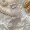 Женские осенне-зимние толстые теплые носки-гольфы для дома и сна с отворотом и тканой этикеткой