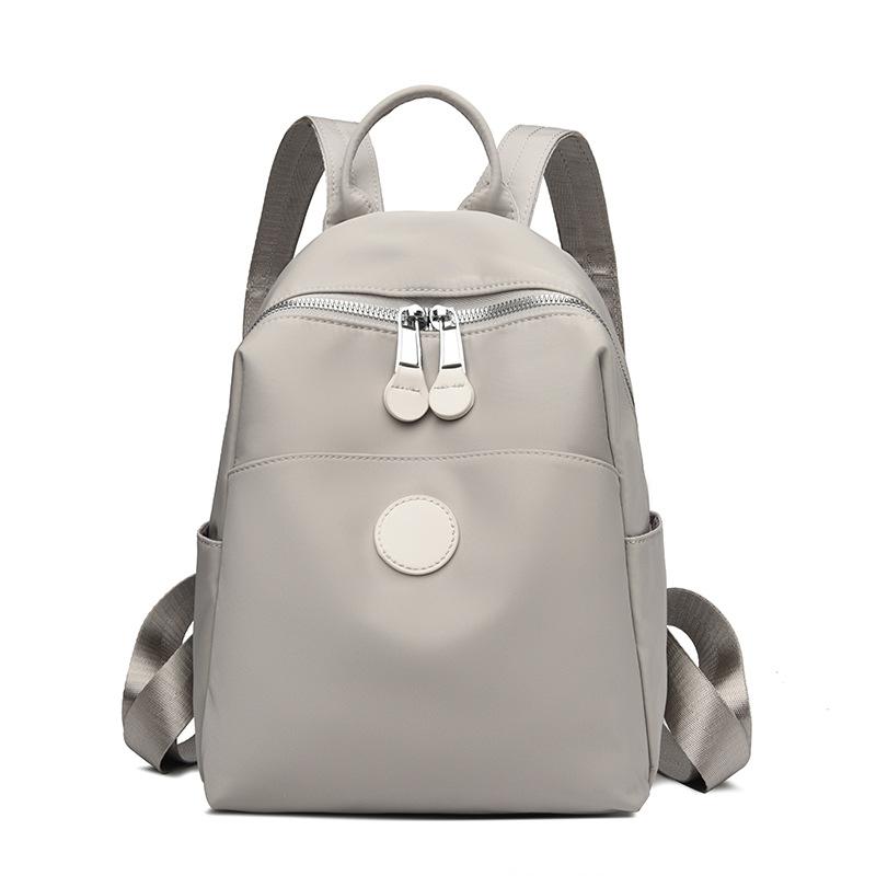Весенний женский модный нейлоновый водонепроницаемый дорожный и городской небольшой рюкзак простой холщовый школьный портфель