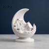 Study Room Desk Sculpture 3D Printed Crescent Moon and Snowy Village Figurine Mini House Statue Unique Resin Craft Ornament with Stable Base,