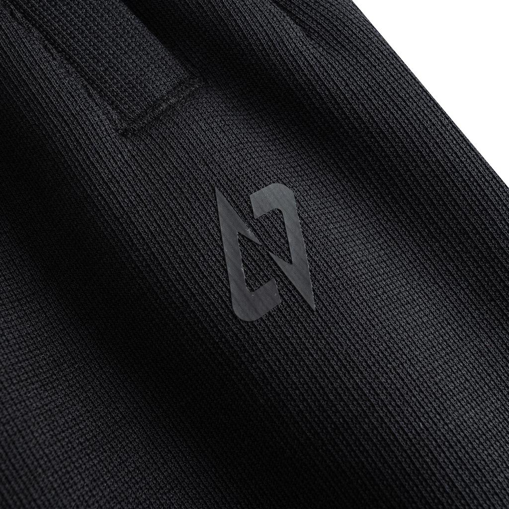 Anta Серия Баскетбол Длинные брюки Весна 2026 Вязаные спортивные штаны Мужские брюки Основной черный 952611302-2