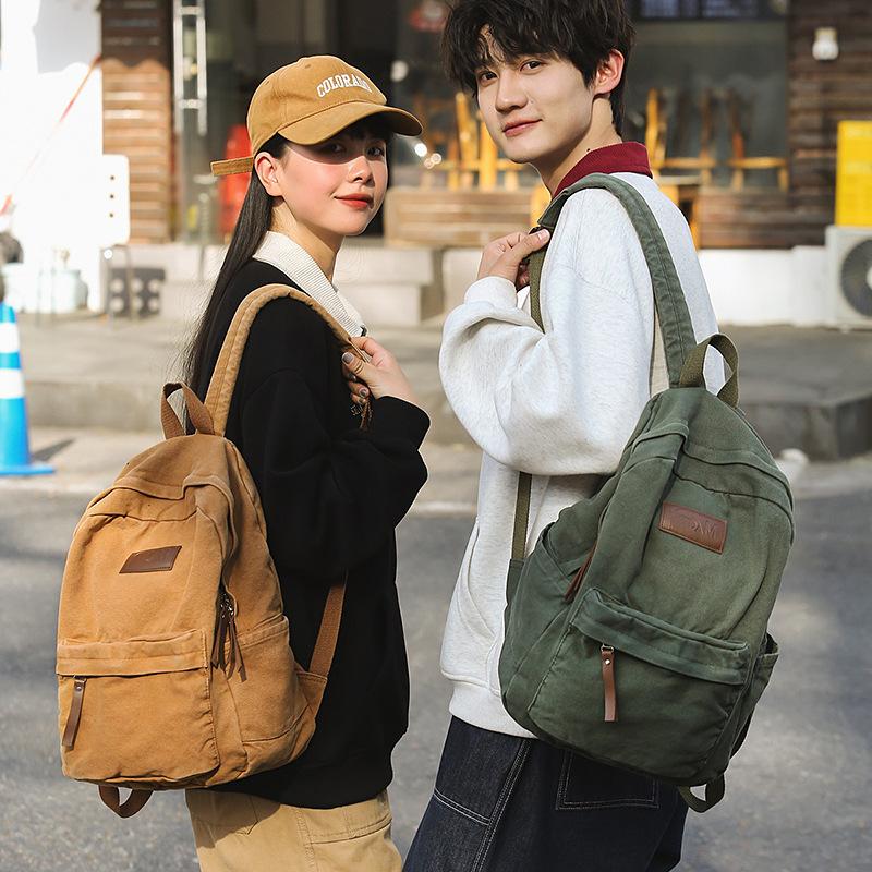 New denim canvas labeled fashionable four-season backpack Japanese and Korean casual large-capacity backpack