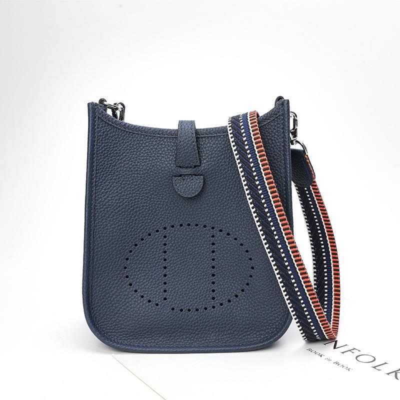 Фабричная оптовая продажа сумка-ведро из натуральной коровьей кожи первого слоя женская сумка с узором личи полый дизайн на одно плечо через плечо полый дизайн