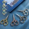 Handmade Retro Stainless Steel Small Scissors for Cross Stitch and DIY Paper Cutting, Seven-Petal Flower Design.