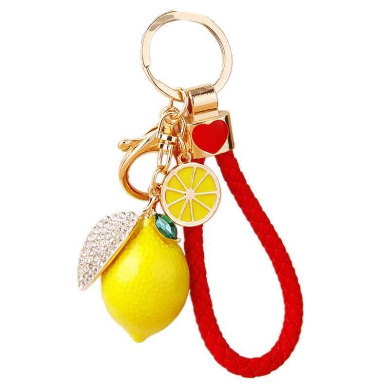 Яркий брелок-лимон с 4 вариантами веревки Прочный металлический материал Компактный 10,5 см Для ежедневного использования