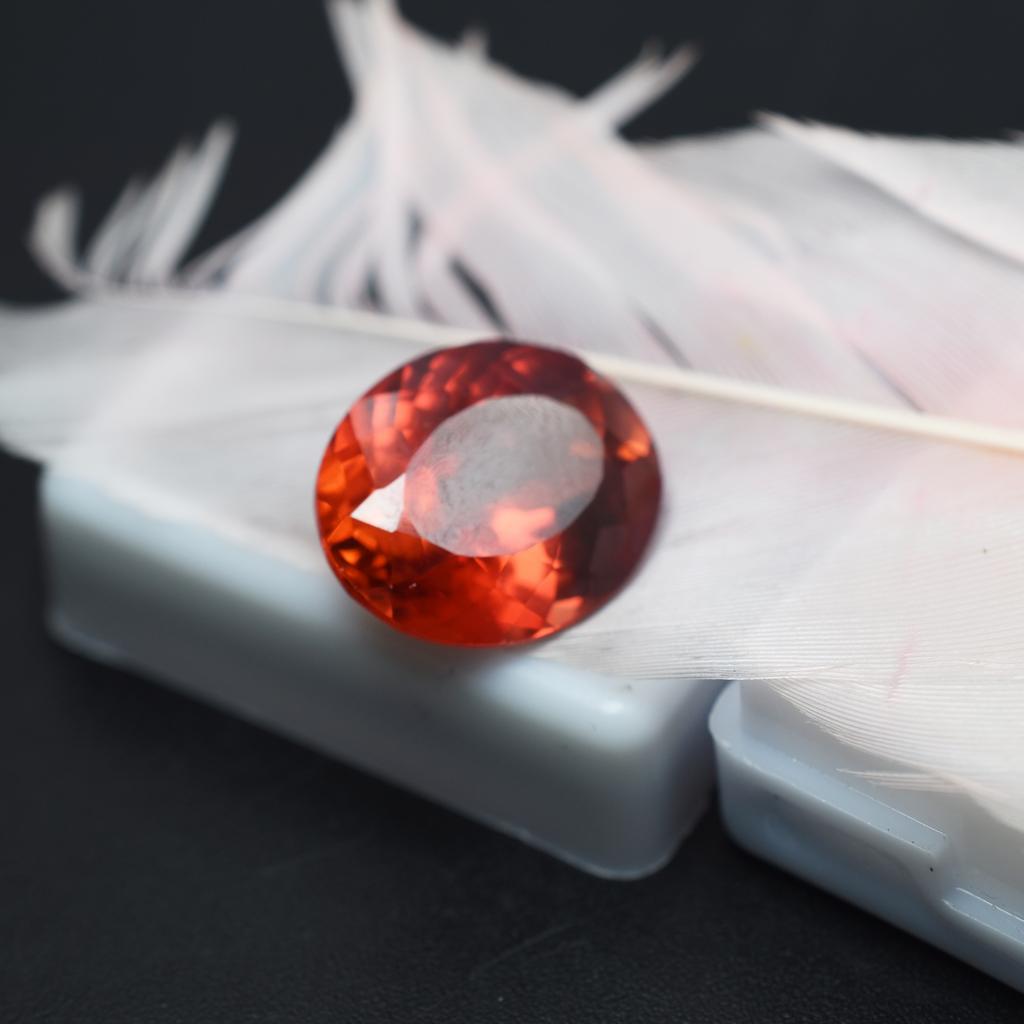 Natural 10.50 Carat Oval Cut Orange Ceylon Sapphire Loose Gemstone