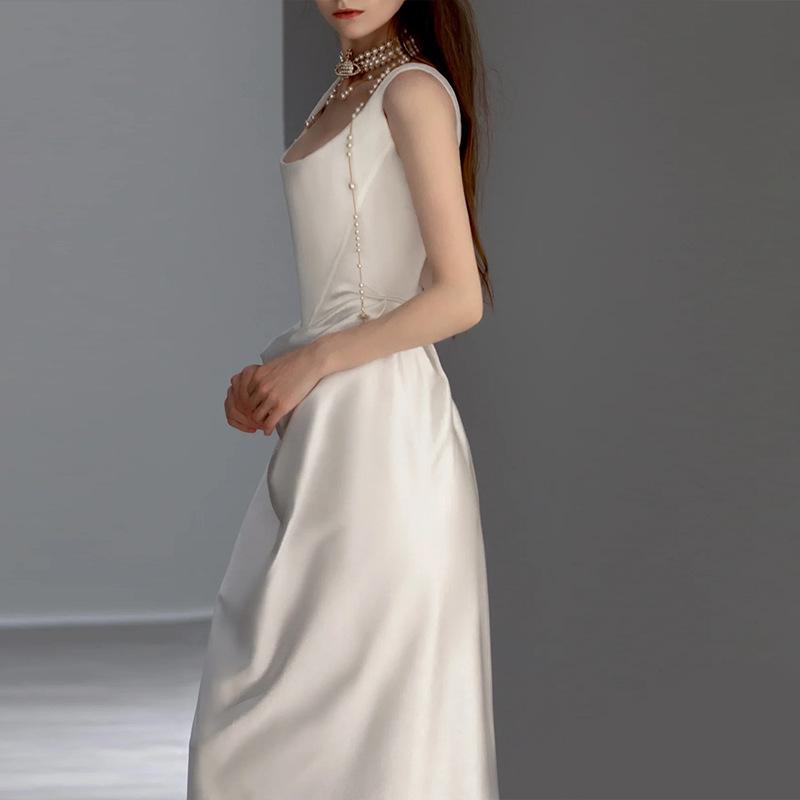 2025 Retro Satin Light Wedding Dress - Simple Spaghetti Strap Gown with Small Train