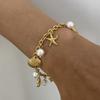 Zora 18K Gold PVD Plated Stainless Steel Pearl Shell Starfish Charm Bracelet Bangle Women Waterproof Beach Jewelrry Gift