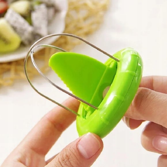 Kiwi slicer tool stainless steel for cutting and peeling