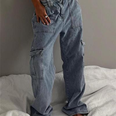 Новые прямые джинсы с карманами и фланцем