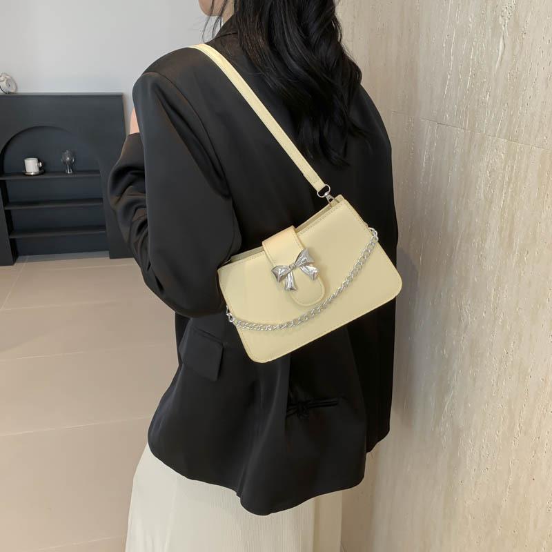 Сумка через плечо с бантом и цепочкой в иностранном стиле, женская, весна-лето, новая модная корейская версия, универсальная однотонная сумка с нишевой текстурой