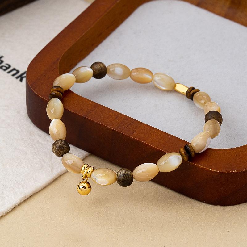 New Chinese coffee crystal cat eye shell agarwood beaded bracelet fashionable versatile high-end rice bracelet stacked wear