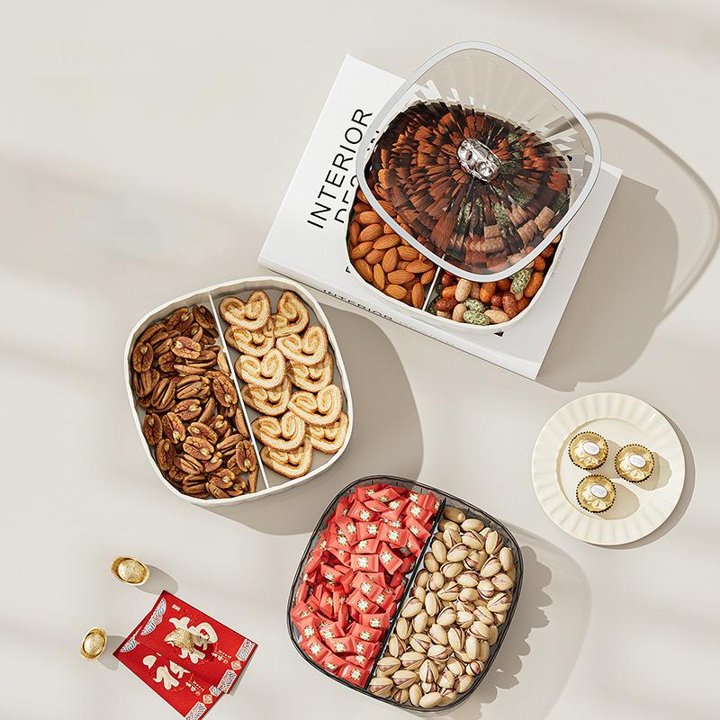 Тарелка с сухофруктами, бытовая гостиная, журнальный столик, коробка для конфет, тарелка с закусками, фруктовая тарелка, прозрачные тарелки с орехами и семенами дыни, закусочная тарелка