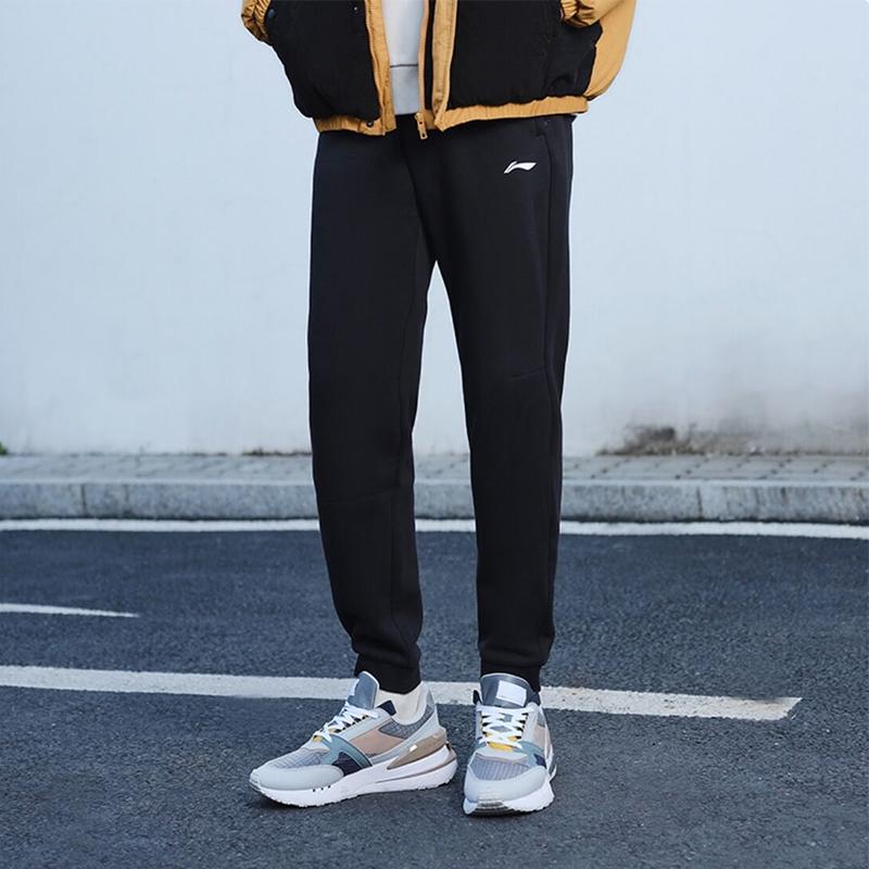 Li-Ning Однотонные свободные трикотажные зауженные спортивные брюки с эластичной резинкой на талии, унисекс, черные AKLT809-1