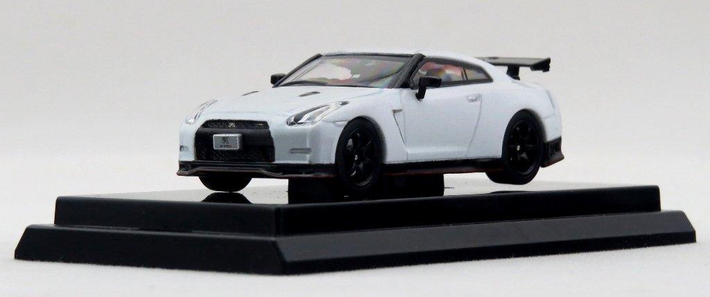 Избыточная поворачиваемость NISSAN NISMO Brilliant White Pearl Готовый продукт 1/64 GT-R (2014)