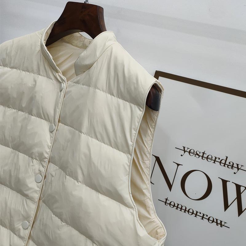 Женский легкий пуховый жилет 2025: Теплый, Без рукавов, Воротник-стойка, Модный пух белой утки для осени/зимы.