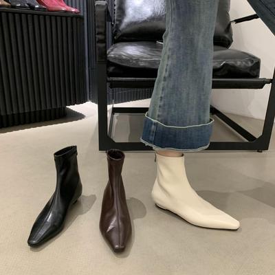 Жареные мягкие клиновидные каблуки~ 2025 осень и зима новые белые костяные эссенции для通勤 плоская подошва бежевые короткие сапоги простые