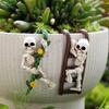 2PCS Skeleton Pot Hugger Decor,Resin Climbing Skeleton Plant Pot Hanger Ornaments for Halloween & Garden