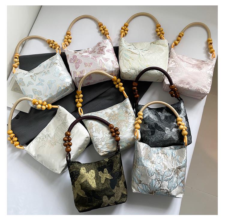 Осень 2025 Вышитая женская сумка-тоут под мышкой: Универсальный повседневный стиль ведра на плечо