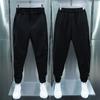 Men Casual Pants Elastic Waist Button Fly Long Pants Pockets Solid Color Fastener Tape Cuffs Tennis Sports Style Trousers