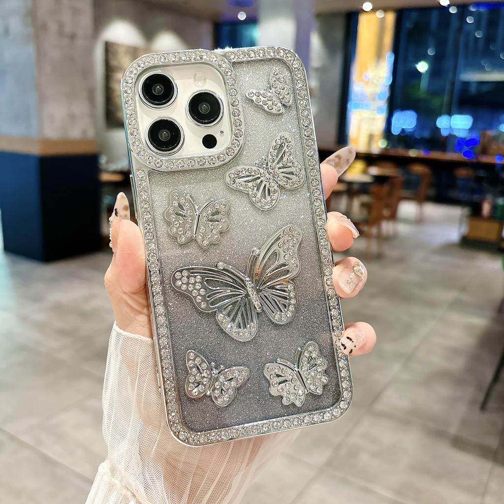 Чехол для iPhone 15 Pro с декором в виде бабочек и стразами, из мягкого ТПУ.