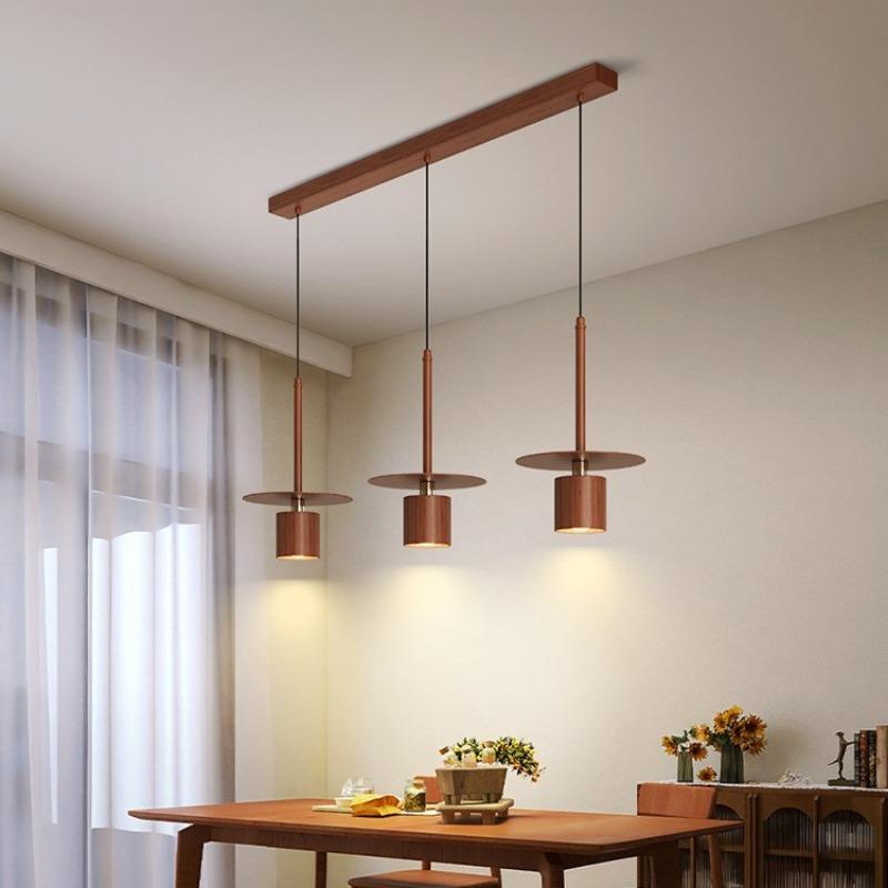 Простая вертикальная маленькая люстра для изголовья кровати