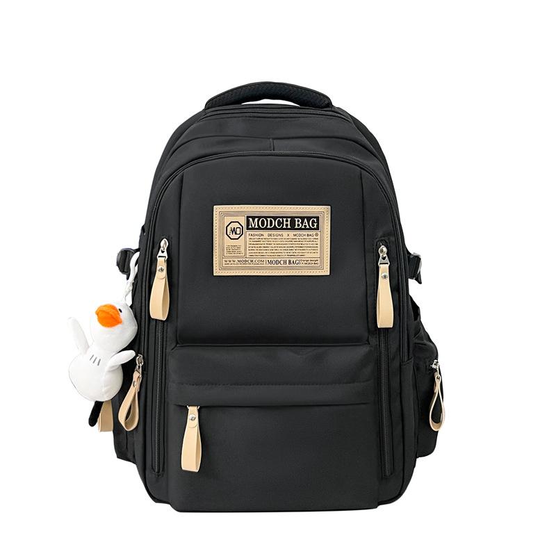 Schoolbag is specially designed for new schoolbags, female students, nylon retro simple, junior high school students, male large-capacity couple .