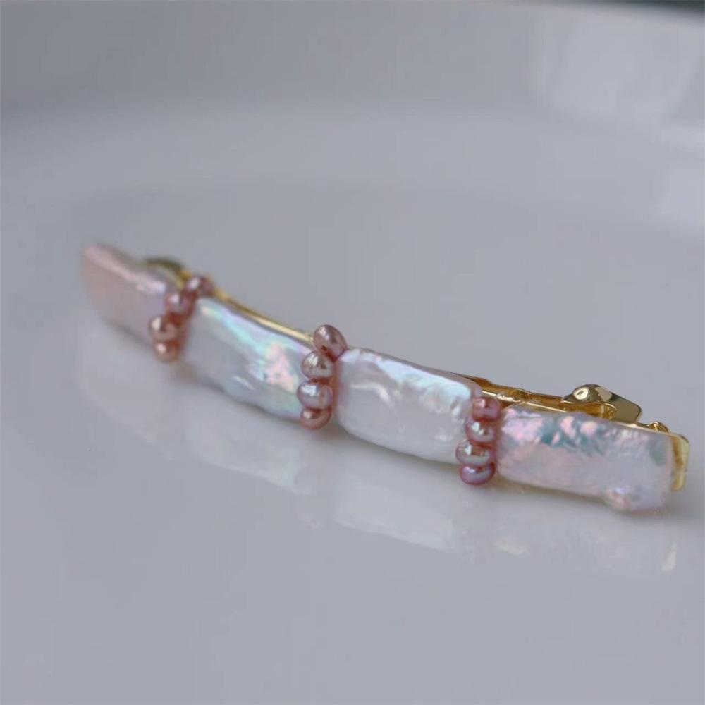 French-style retro spring clip with natural freshwater baroque pearls, a simple and elegant hair accessory for styling updo hairstyles