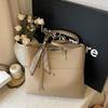 Soft Pu Ribbon Tote Bag For Women With Inner Pockets And Crossbody Strap For Commuting