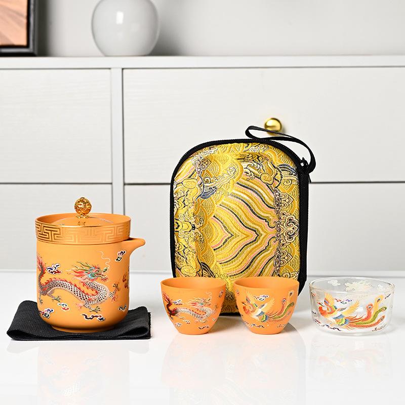 Merchandise Yellow Duan Mud Dragon and Phoenix Ceramic Travel Tea Set, a complete set of outdoor one pot and three cups of business gifts