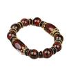 Tibetan Three-Eyed Dzi Beads Unisex Bracelet with Dragon Pattern Ice Flower Agate and Retro Ethnic Style in Red and Yellow.
