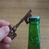 Vintage Key-Shaped Metal Bottle Opener with Keychain Accessory