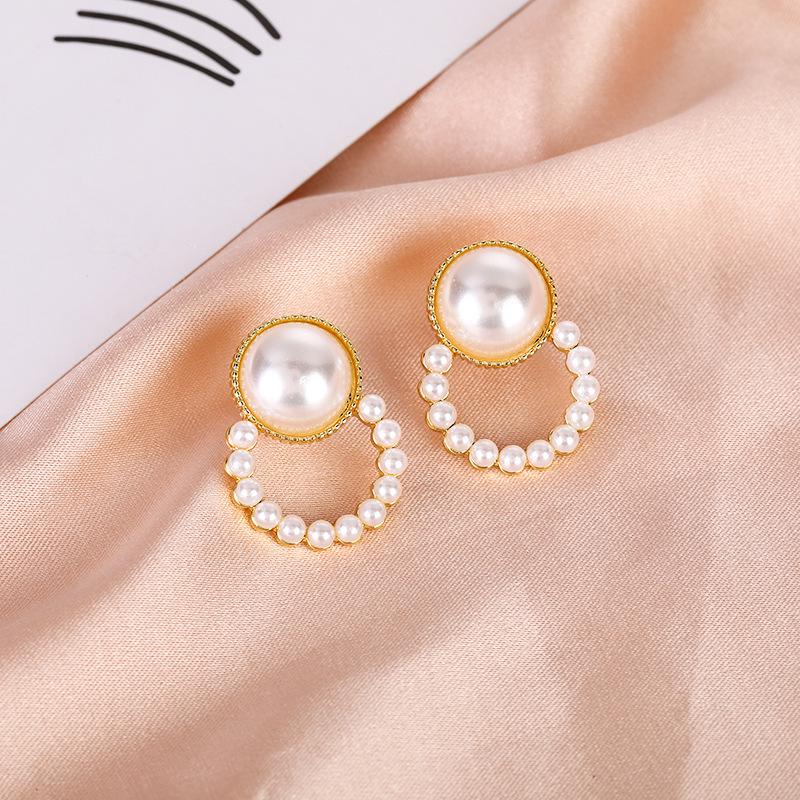 «Серьги-бантики из серебряных игл с жемчугом и цирконием»: Нишевый дизайн, стильный и универсальный, легкий роскошный аксессуар высокого класса.