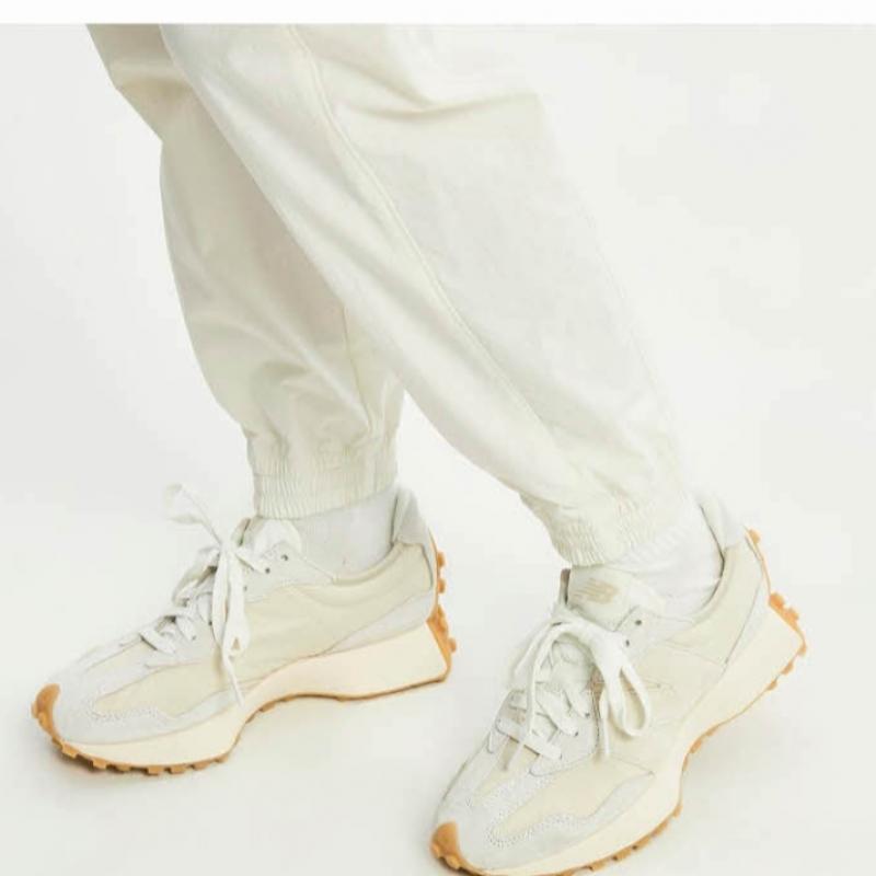 New Balance Брюки Lqj Nbnte2w412 64 Женские нейлоновые эластичные брюки-джоггеры