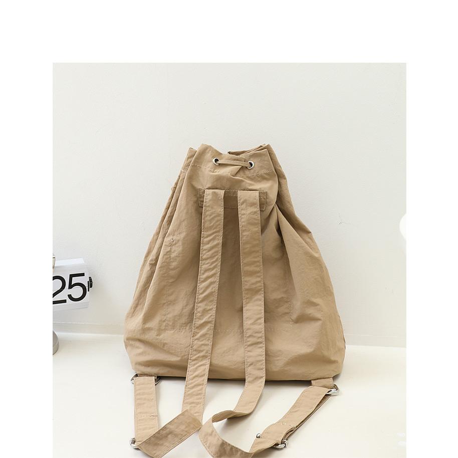 IELGY Korean Version of Casual Literary Canvas Backpack, Fashionable Nylon Solid Color Small Fresh Drawstring Backpack