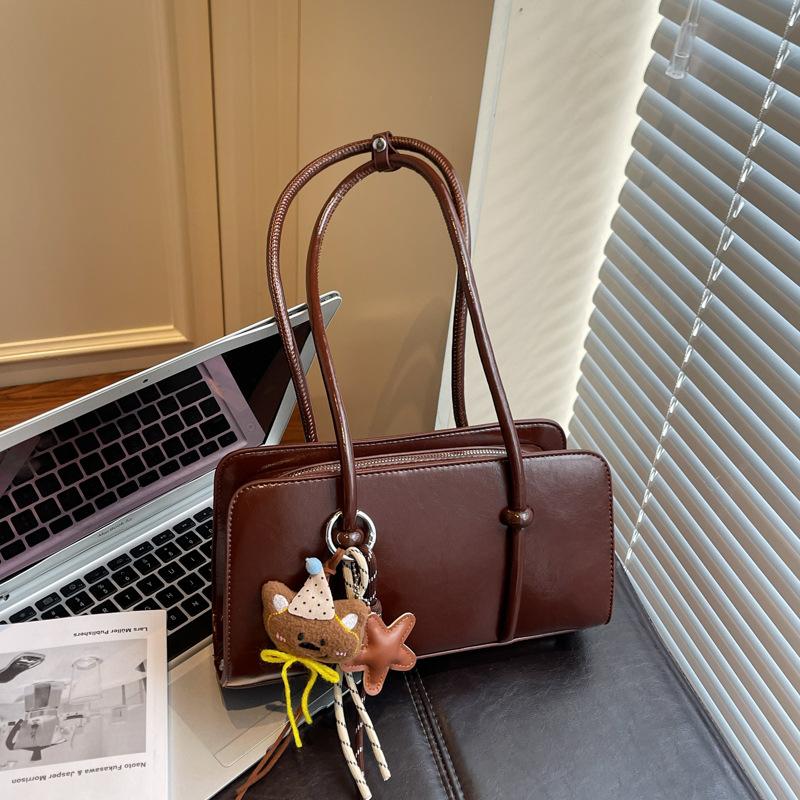 Ретро сумка женская большой вместимости 2025 новая осень и зима универсальная на плечо подмышку сумка повседневная текстура деловая сумка-подушка