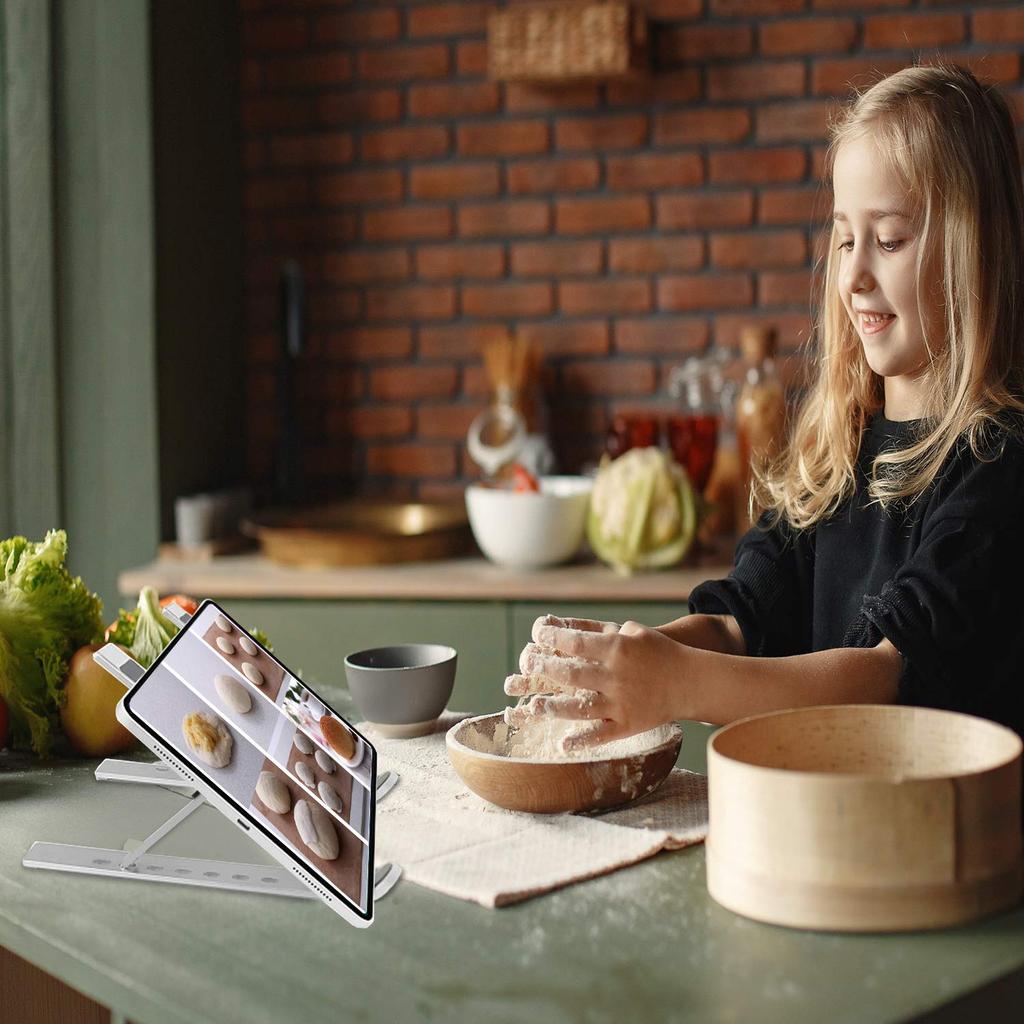 Foldable laptop stand with 7 adjustable tablet and aluminum alloy Lightweight and suitable for and harborii angles, stand, construction. non-slip,