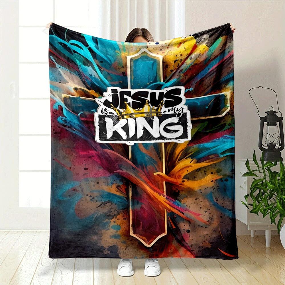 A cross surrounded by colorful paint splashes with text overlay. for all seasons blanket lunch break throw gift