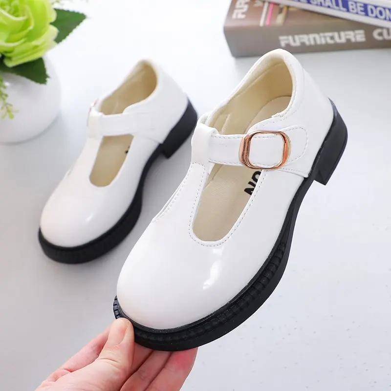 Детские кожаные туфли для школьной вечеринки, черные, белые, для девочек, модельные туфли, детские кожаные туфли на плоской подошве с Т-образным ремешком, простые, классические, с пряжкой, размеры 26-36, новые
