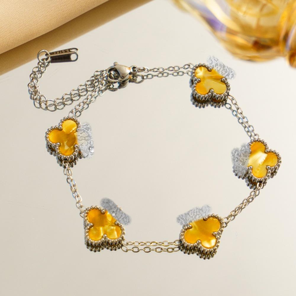 Браслет с градиентным четырехлистным клевером Роскошный и изысканный женский модный ювелирный аксессуар Уникальное и стильное украшение для руки