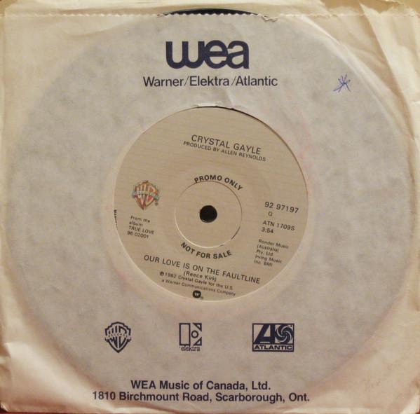 7-дюймовая пластинка CRYSTAL GAYLE Our Love Is On The Faultline 9297197PROMO Warner Bros. Ре 1982 Канада Рок Б/У