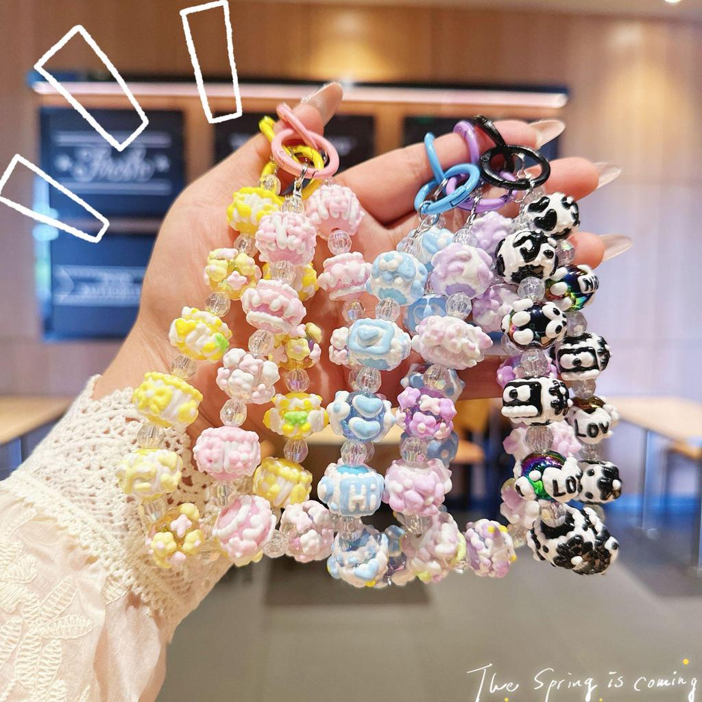 Расписанный вручную бисерный шнурок для телефона и брелок-шарм