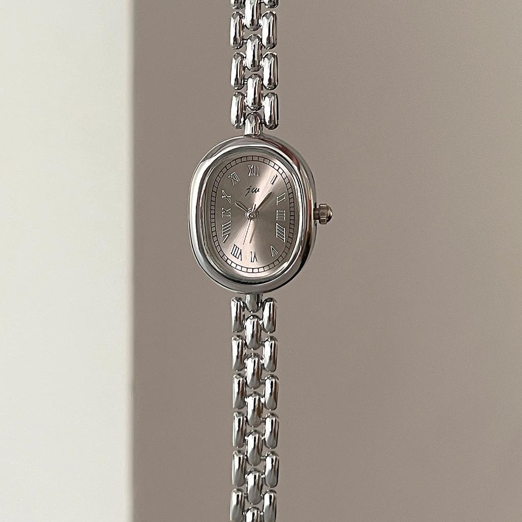 Authentic Jingwei Oval Vintage Women's Quartz Watch with Retro Roman Alloy Bracelet
