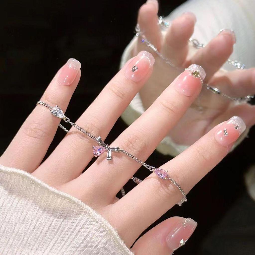 Изысканный браслет-бантик из розового циркония - новый дизайн ювелирных изделий класса люкс 2025 года