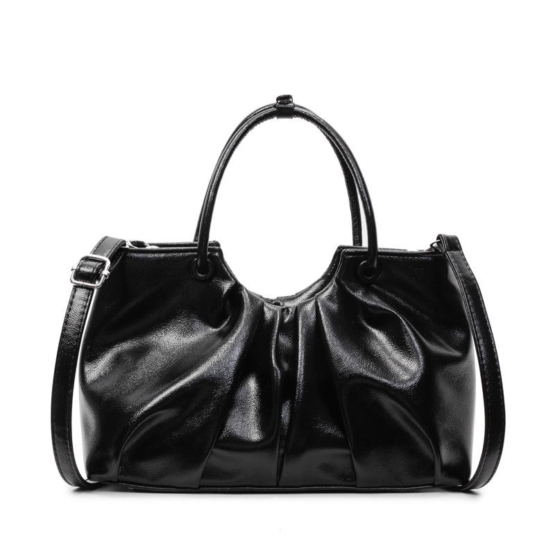 Корейская версия нишевой дизайнерской плиссированной сумки в иностранном стиле, женская универсальная сумка-мессенджер для通勤 из масляной вощеной кожи с чувством стиля