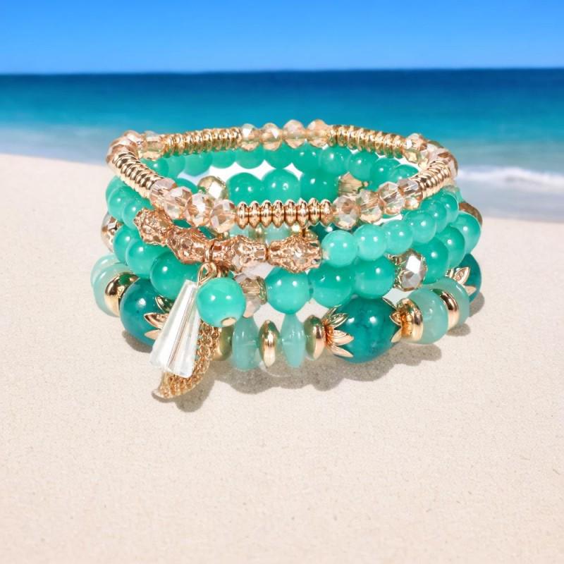 Шикарный женский браслет в стиле бохо с четырьмя слоями стеклянных бусин и кисточками