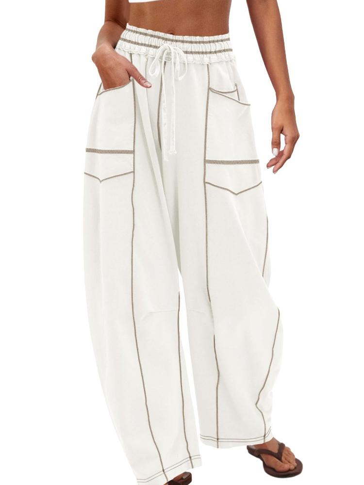 Женские бежевые брюки широкого кроя с кулиской на талии и боковыми карманами