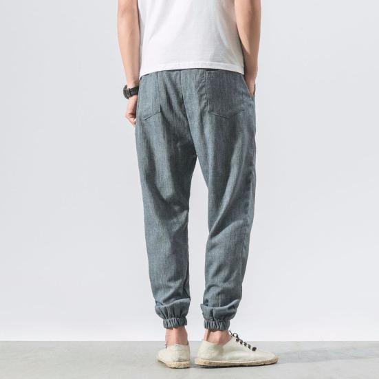 Весна Осень Мужские шаровары Шаровары Свободные завязывающиеся на шнурок эластичные карманы Глубокий шаговый шов с резинкой на щиколотке Однотонные спортивные брюки Повседневная одежда Спортивные брюки