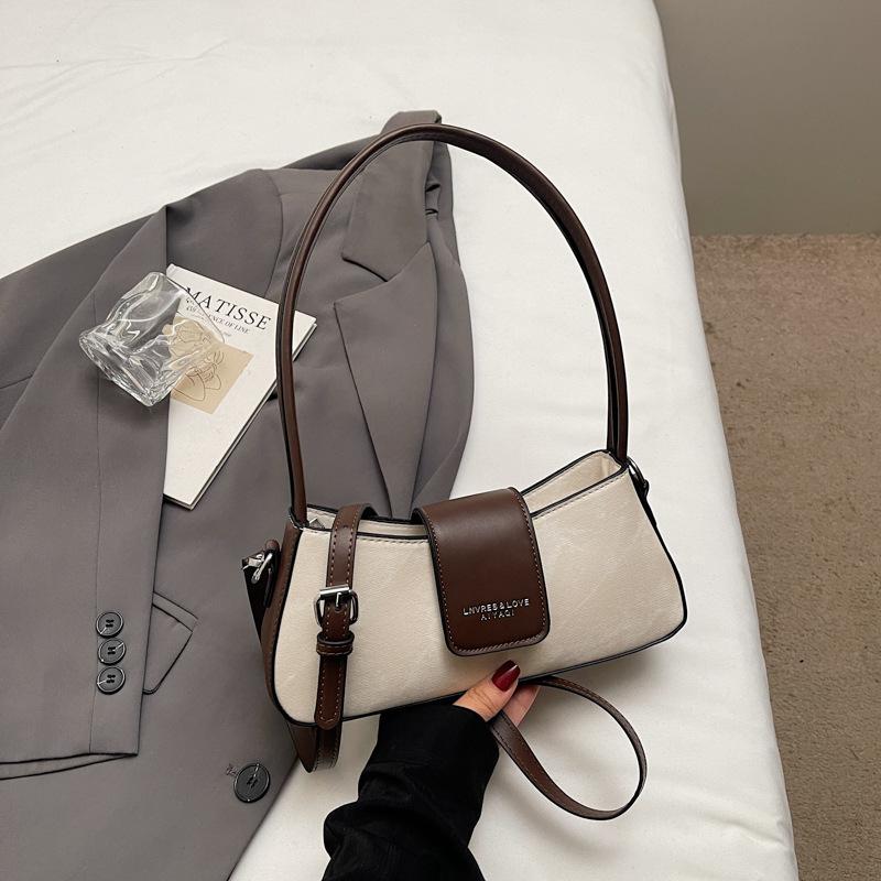 Textured small bag women's new women's versatile messenger bag French niche single shoulder underarm bag French stick bag