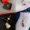 Luxury Gourd Necklace: 18k Rose Gold with White Mother-of-Pearl & Red Chalcedony Pendant